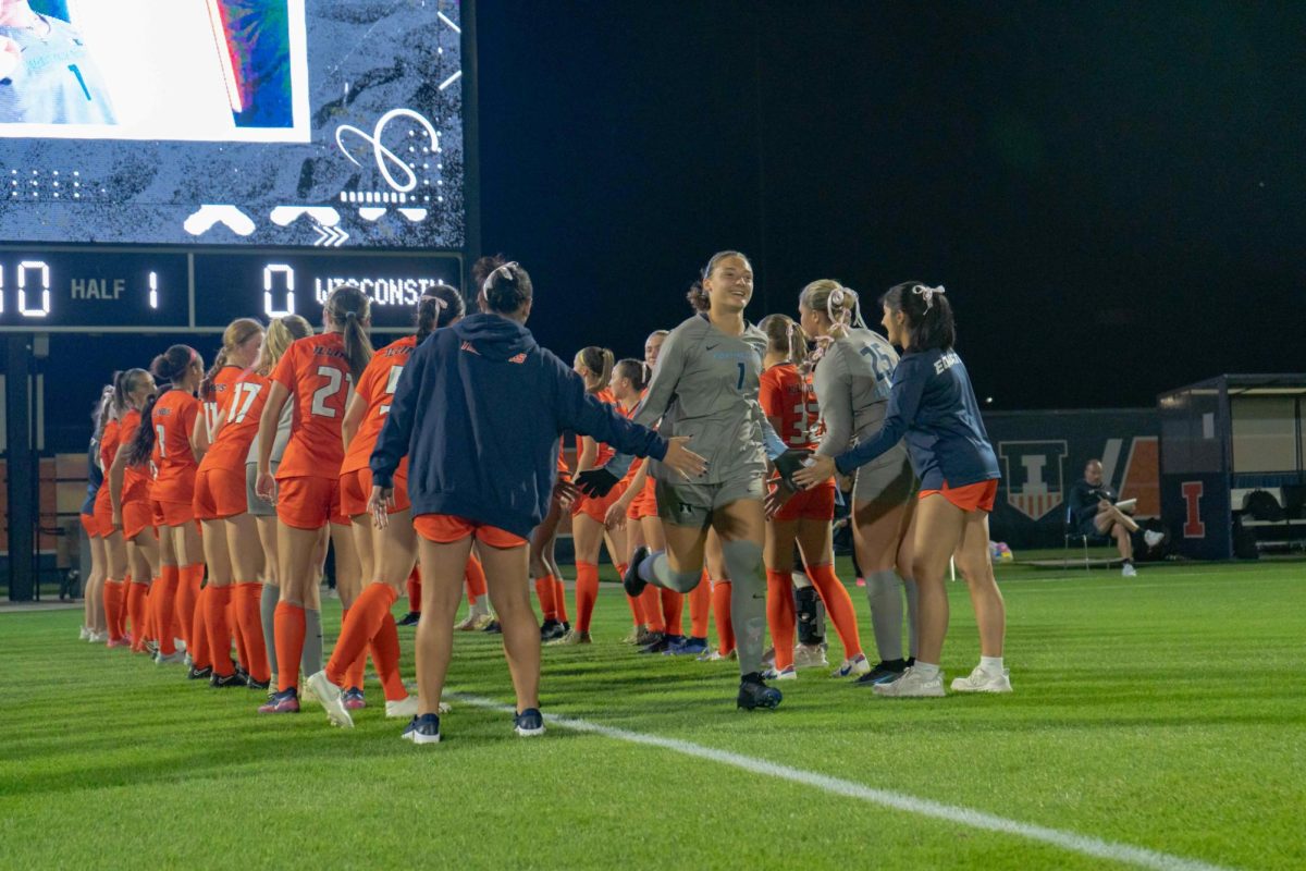 Goalkeeper Julia Cili, senior, runs onto the field before the soccer game versus Wisconsin on Oct. 12, 2023.