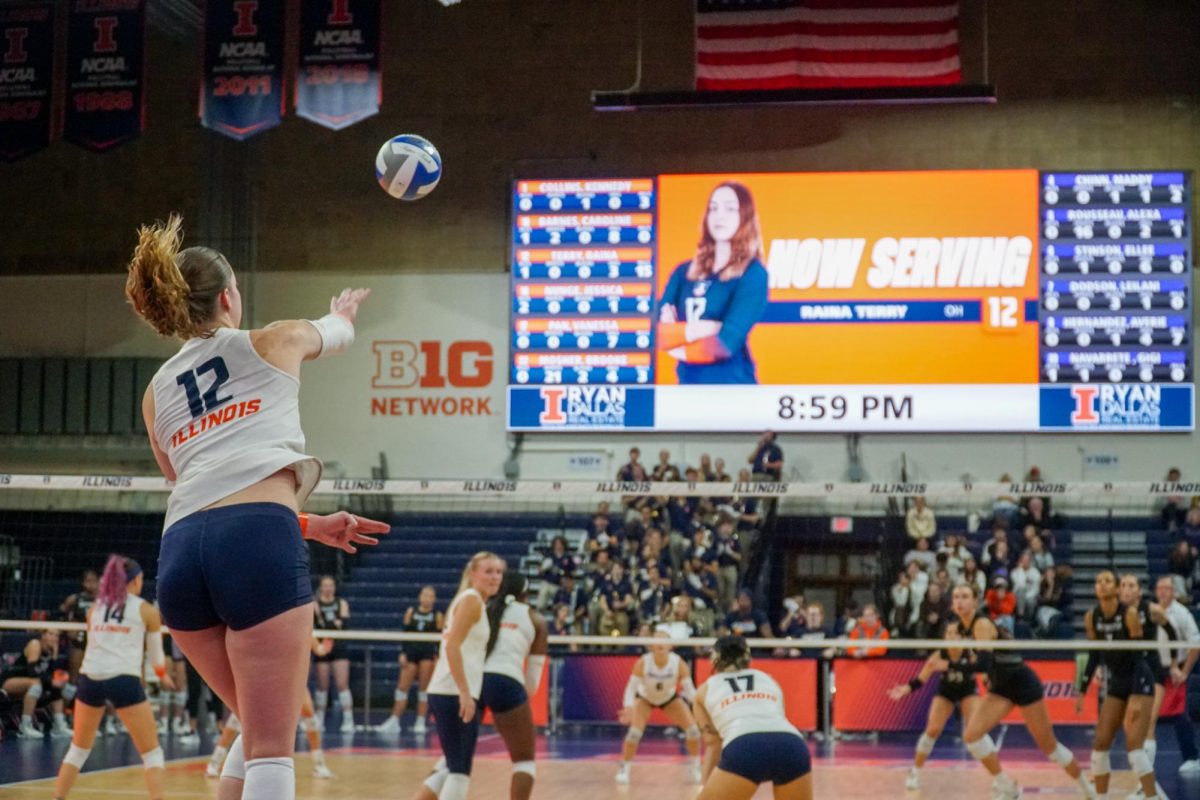 Graduate student Raina Terry serves during the second set in a match on Nov. 1, 2023.