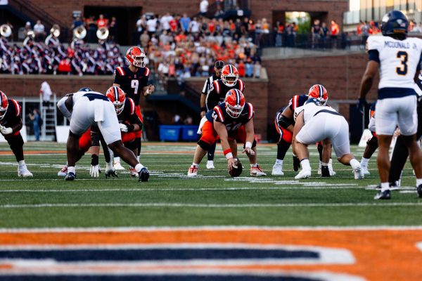 Quarterback Luke Altmyer waits for a snap on Sept. 2, 2023. 