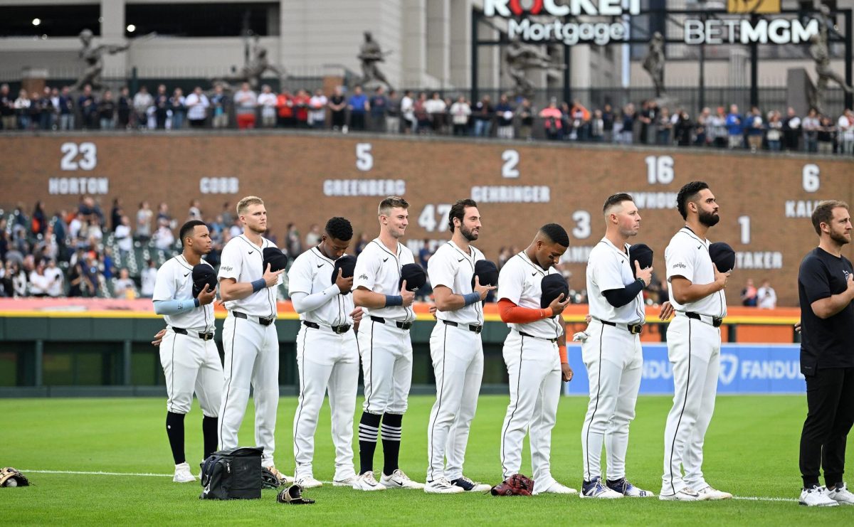 Tigers players stand during the national anthem. Detroit Tigers take on the Chicago White Sox at Comerica Park in Detroit on September 27, 2024.