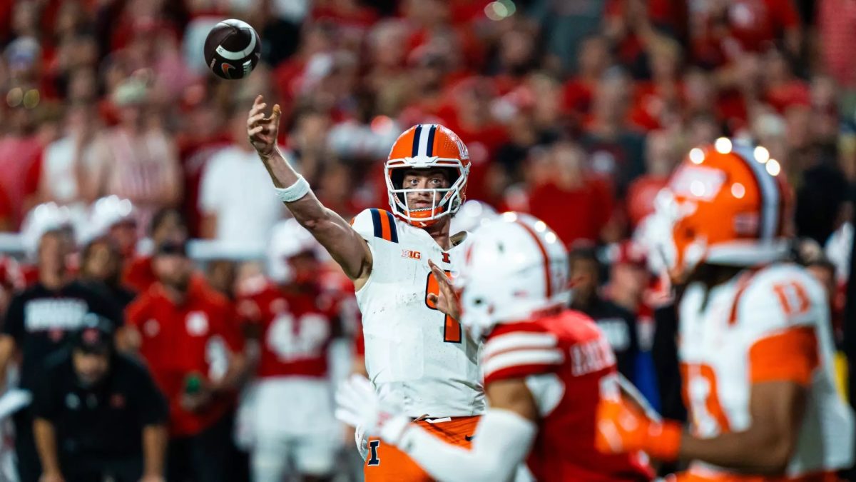 Quarterback Luke Altmyer throws down the field in Illinois' big win over Nebraska on Sept. 20.