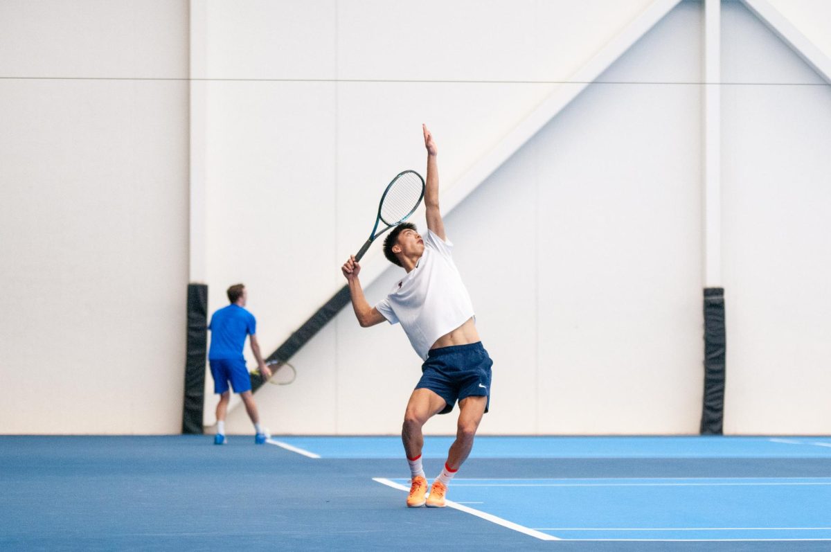 Junior Kenta Miyoshi serves in a match against Duke, winning 2 sets to 1 on Feb. 2.
