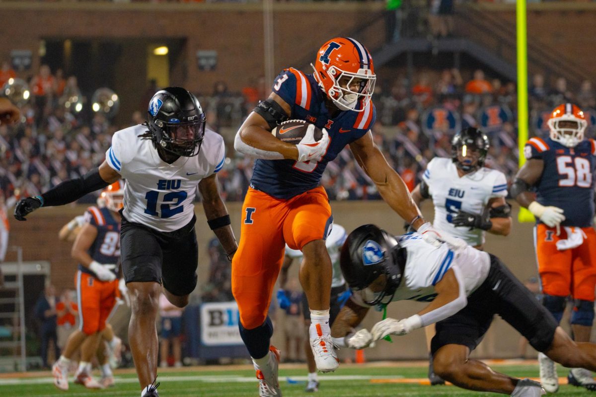 Runningback Kaden Feagan Leaps over Eastern Illinois defences during the first football game of the 2024 season in Memorial Stadium on West Kirby Ave.