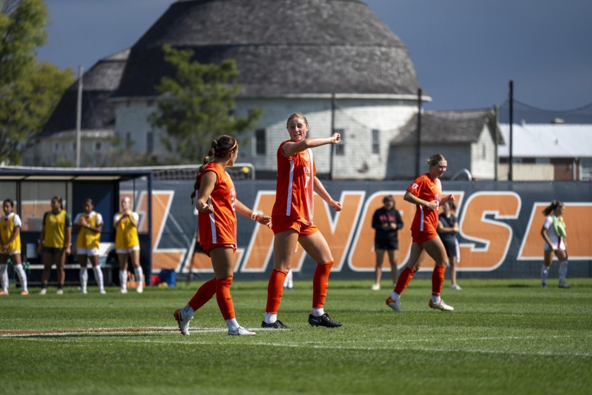 Sarah Hiestand and Lia Howard discuss tactics during a match against Maryland on Sept. 29.