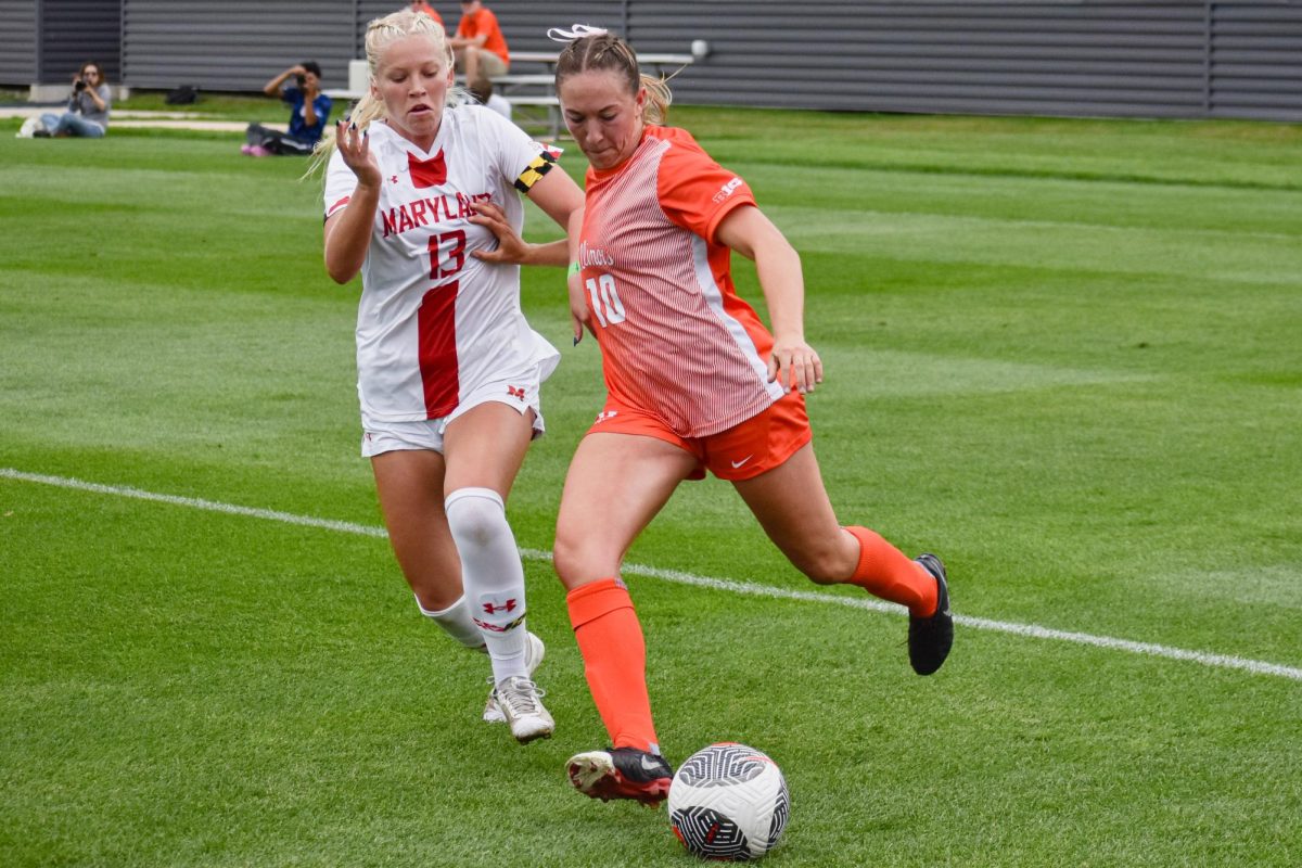 Abby Lynch dribbling toward to pass to her teammate for the opportunity to shoot against Maryland on Sept. 29.