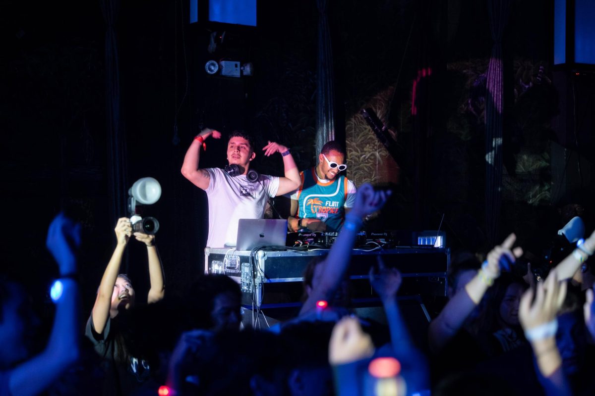 DJ Rollie and DJ Ivo pump up the crowd at Red Bull Turn It Up on October 5 at Canopy Club.