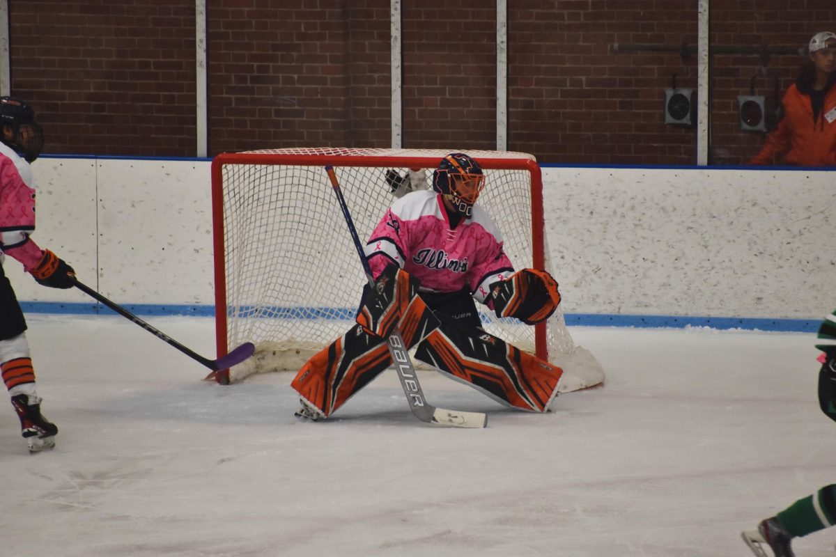 Nolan Woodring defends against Roosevelt University during a hockey game on Oct. 27, 2023, in Champaign.