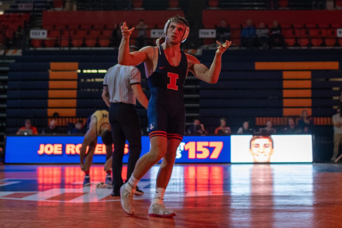 Junior Joe Roberts looks to the crowd following a match during the Illinois vs. Navy meet on November 4, 2023.