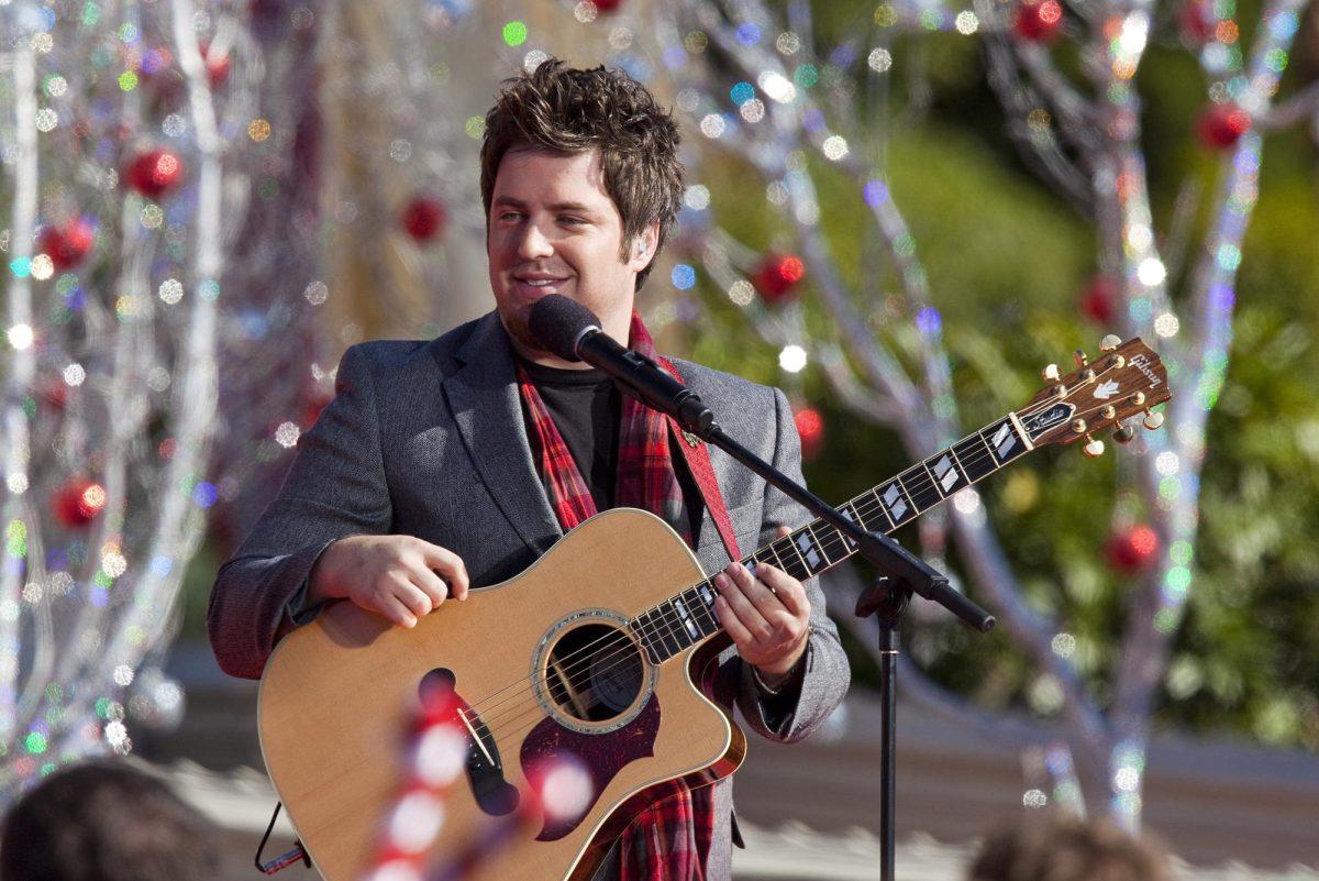 Lee DeWyze, season 9 champion of "American Idol", performs "The Little Drummer Boy" on December 4, 2010 while taping a segment for the Disney Parks Christmas Day Parade at the Magic Kingdom in Lake Buena Vista, Florida.