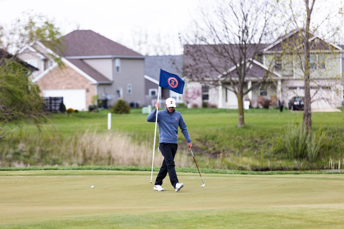 The Illini compete in the 2023 Spring Collegiate during a cold windy day.