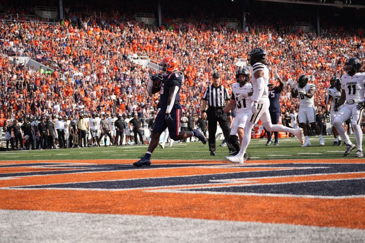 Running back Josh McCray rushes into the end zone to score the first touchdown of the game against Purdue, Oct. 12. 