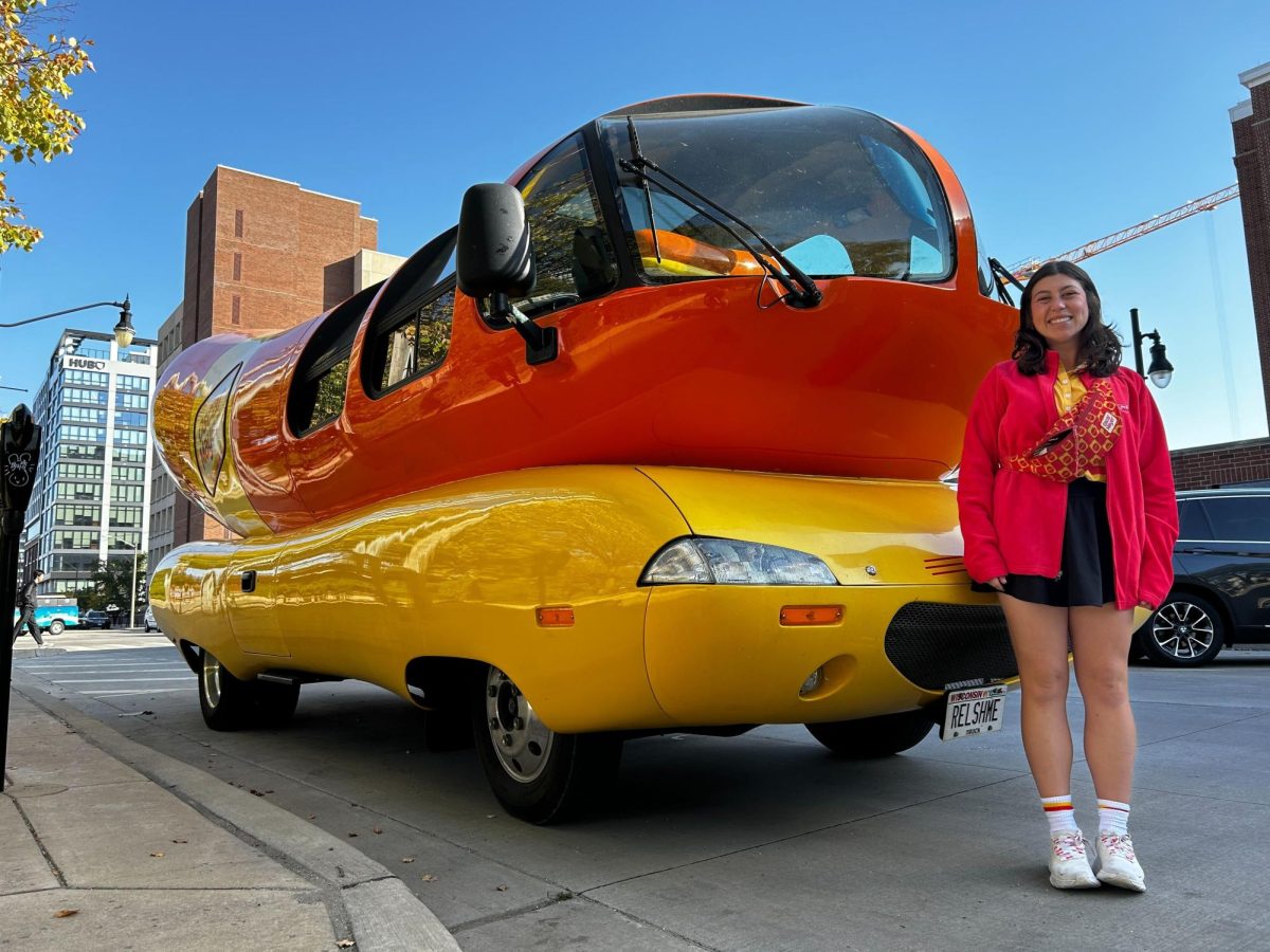 The Oscar Mayer Wienermobile and its driver, Sarahkraut, on the corner of Wright and Sixth streets on Oct. 10.