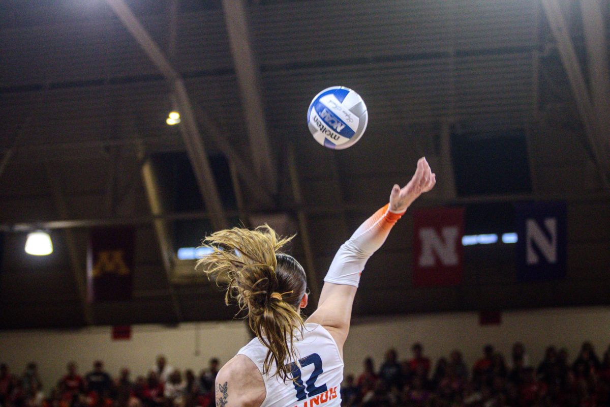 Graduate Outside Hitter Raina Terry spikes the ball in Thursday's match against Nebraska.