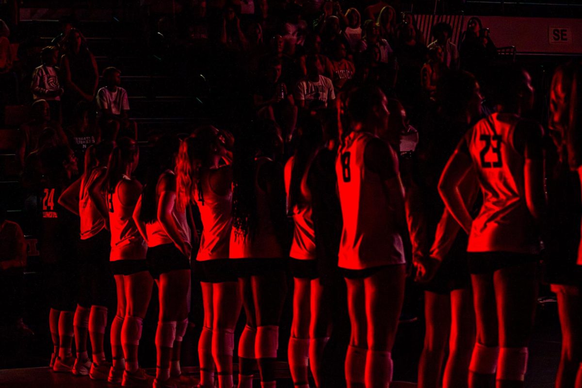 The Illini volleyball team line up at the baseline in Huff Hall before the game against the Nebraska Cornhuskers on Oct. 3.