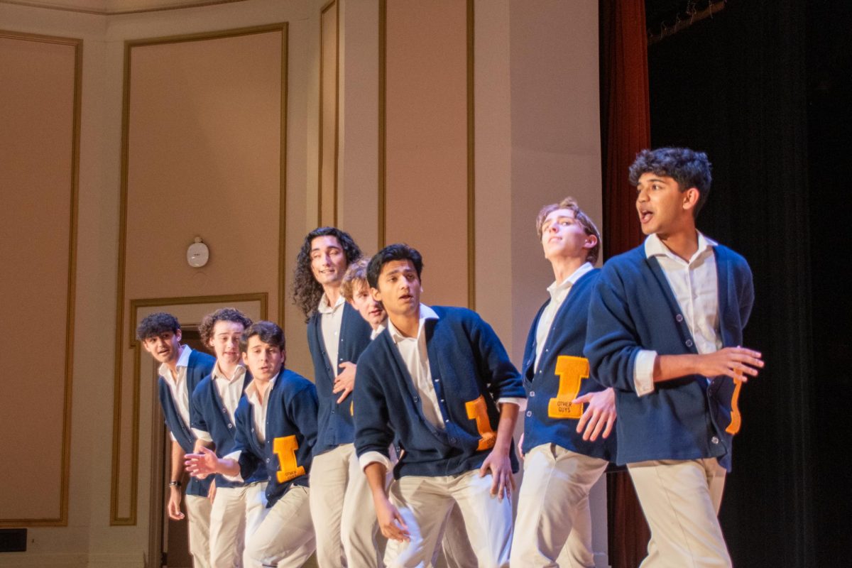 The Other Guys perform during Acatoberfest at Foellinger Auditorium on Saturday, Oct. 26.