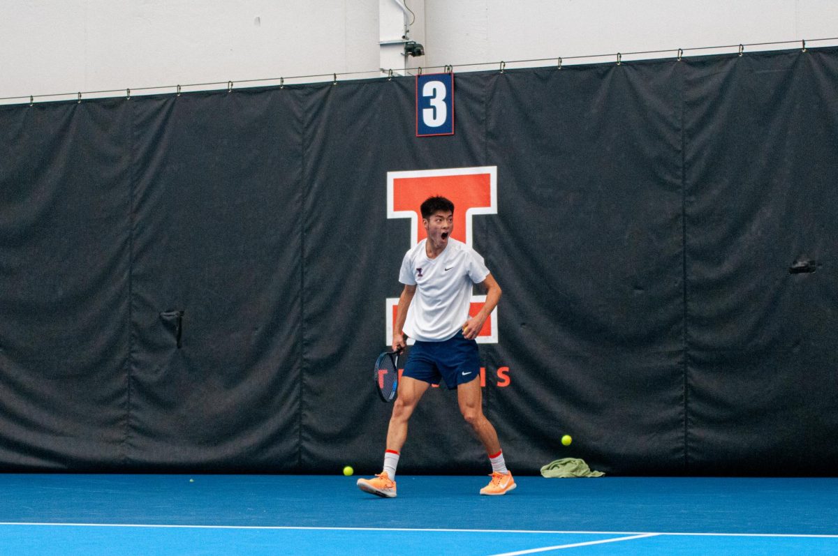 Junior Kenta Miyoshi celebrates a point during a 5-2 Illinois win over No. 8 Duke on Feb. 2.