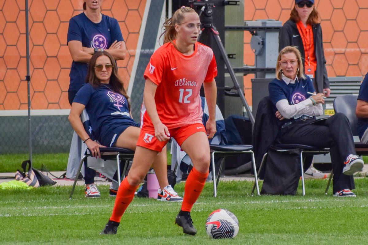 Janet Rayfield watches her team from the sideline on Sep. 29. 