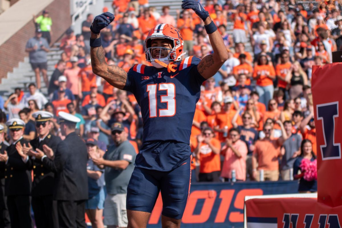 Senior wide receiver Pat Bryant runs out of the tunnel to a big applause at Memorial Stadium on Oct. 12. 