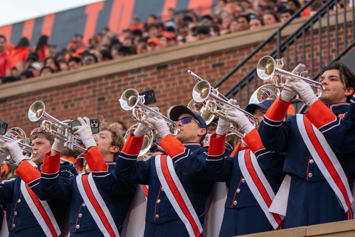 The Marching Illini play a tune behind the North endzone in a close game against Purdue on Oct. 12.