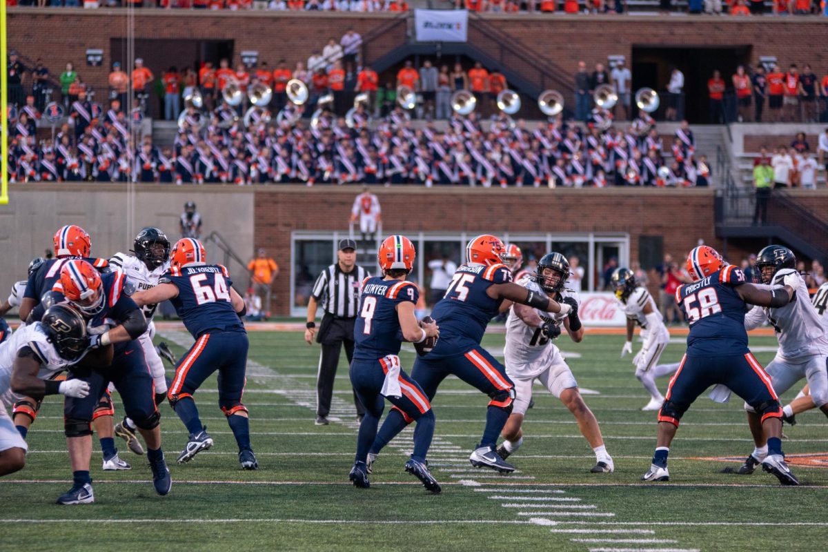 Luke Altmyer stands in the pocket on Oct. 12 at Memorial Stadium.