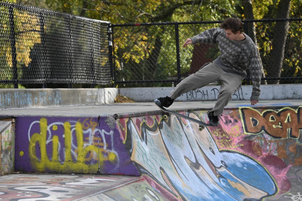 Thomas Rademaker perfoms some skate tricks at Spalding Park on Sunday, Oct. 13.