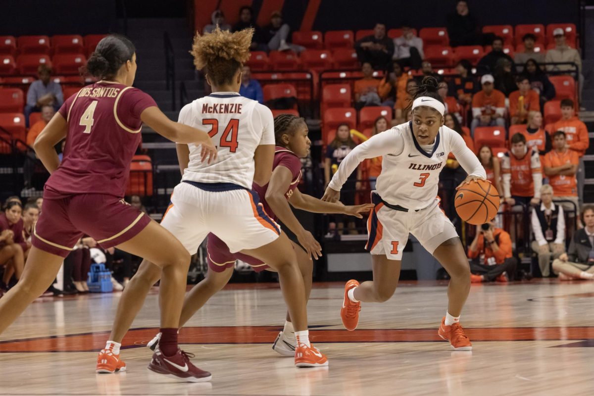 Fifth-year guard Makira Cook uses a screen to drive to the basket for a layup against No. 19 Florida State on Nov. 3.