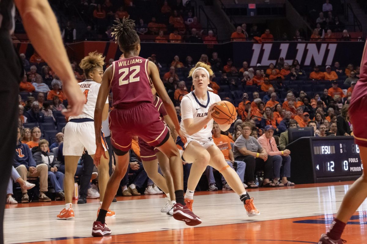 Sophomore guard Gretchan Dolan curls around a screen for a wide open shot on Nov. 3.