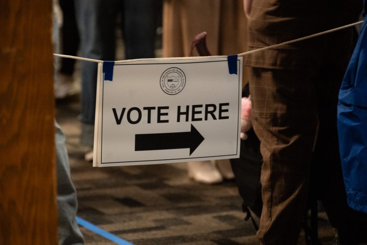 A voting sign hangs at the University YMCA on Nov. 5, signaling the entrance to the polling place.