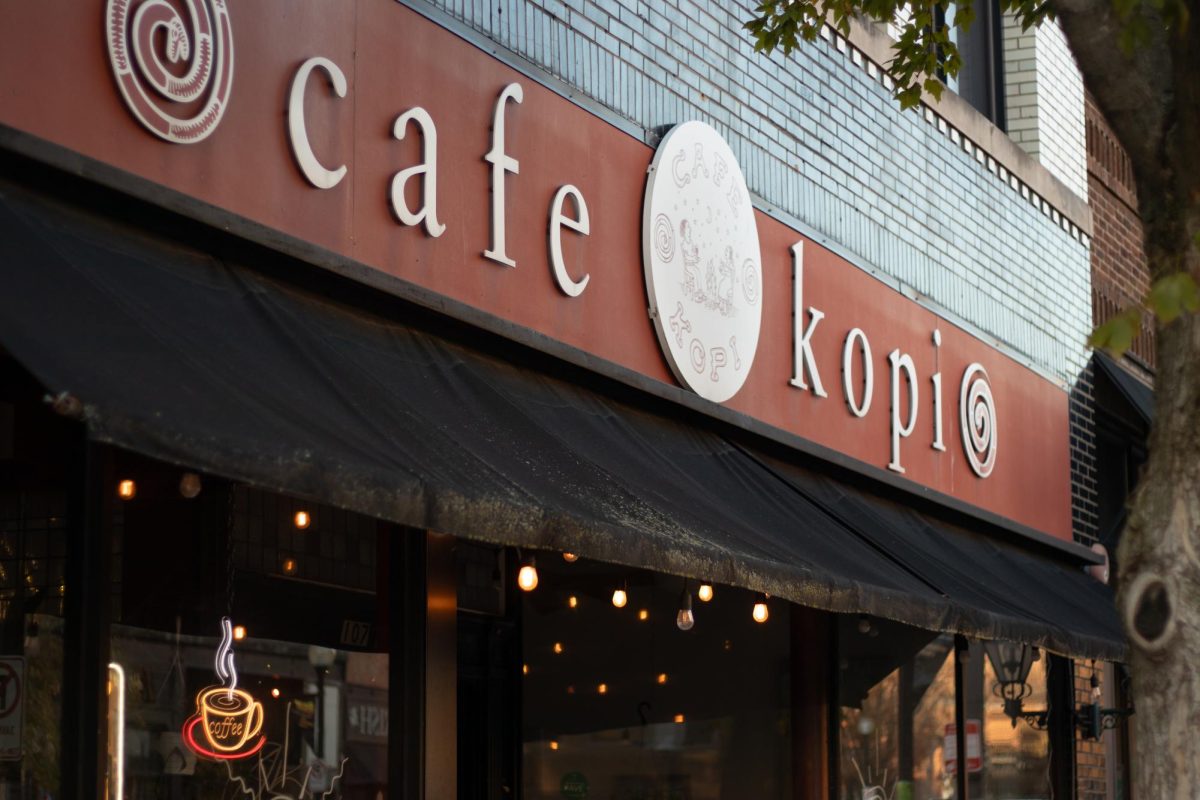 The storefront of Cafe Kopi in downtown Champaign on Thursday. The café, a staple in the community for 30 years, will close its doors on Dec. 15.