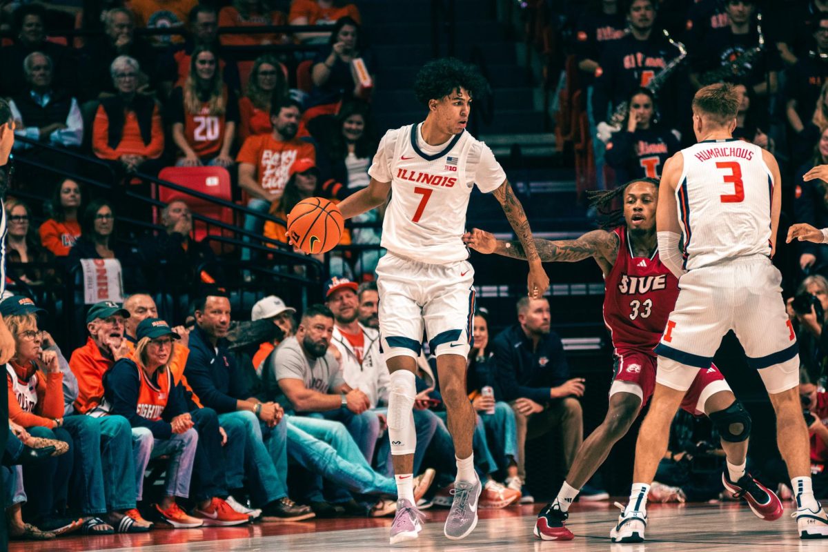 Freshman forward Will Riley accepts a screen for his teammate as he looks for a basket on Nov. 8. 