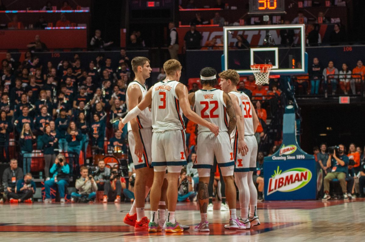 The Illinois starters huddle on the court during a game against Oakland on Nov. 13.