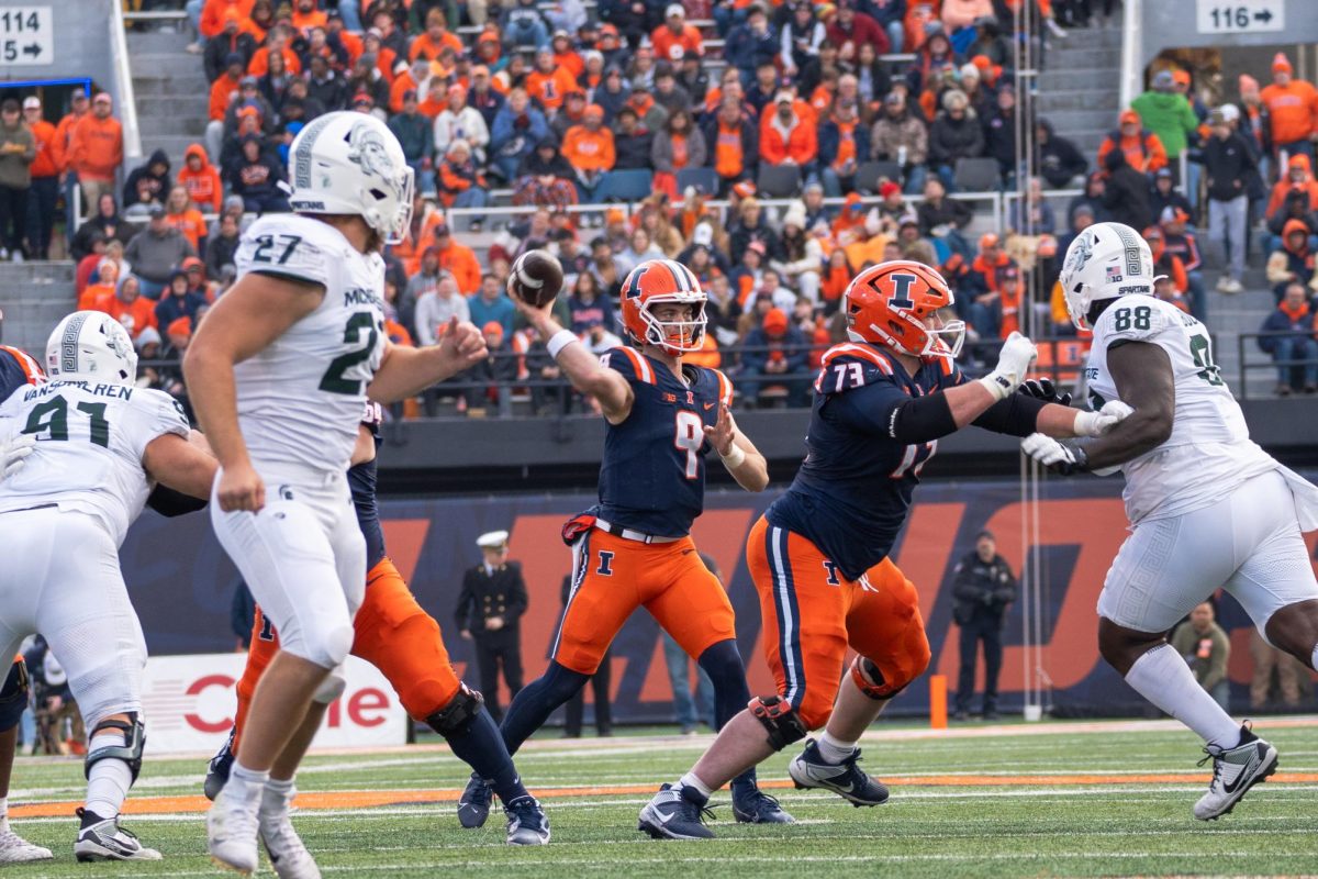 Junior quarterback Luke Altmyer delivers a pass against Michigan State on Nov. 16.