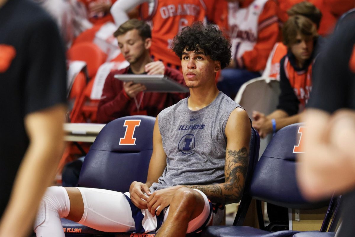 Freshman forward Will Riley sits on the bench ahead of a matchup against SIUE on Nov. 8.