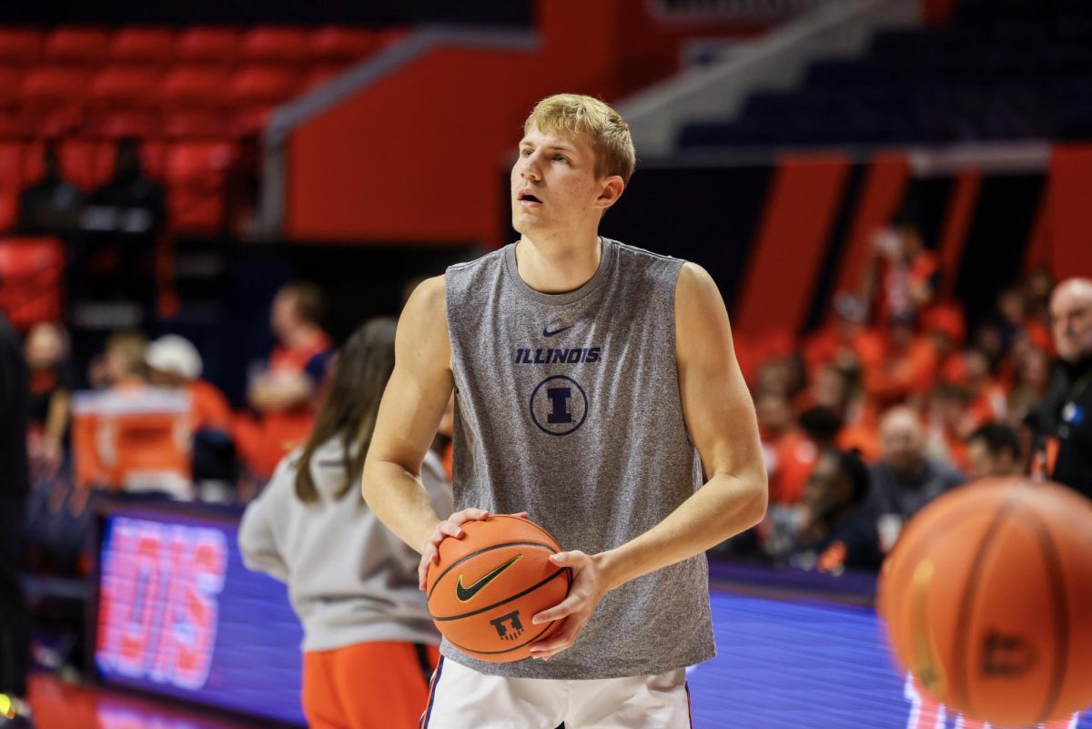 Freshman center Jason Jakstys prepares to shoot the ball ahead of Illinois' matchup with SIUE on Nov. 8.