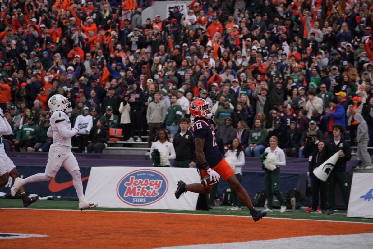 Senior wide receiver Pat Bryant scores a touchdown against Michigan State in Illinois' final home game of the 2024 season. 