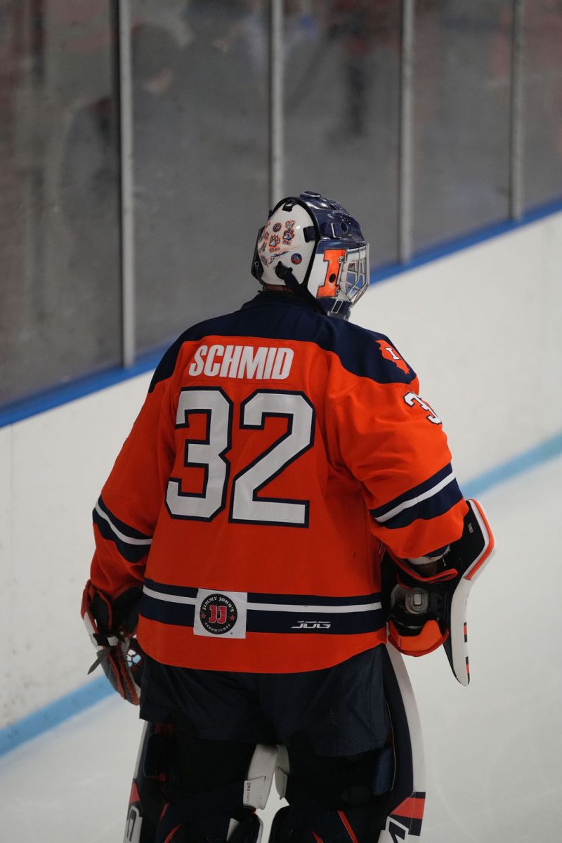 Senior goaltender Joseph Schmid skates the ice before a game against Michigan State on Sept. 20.