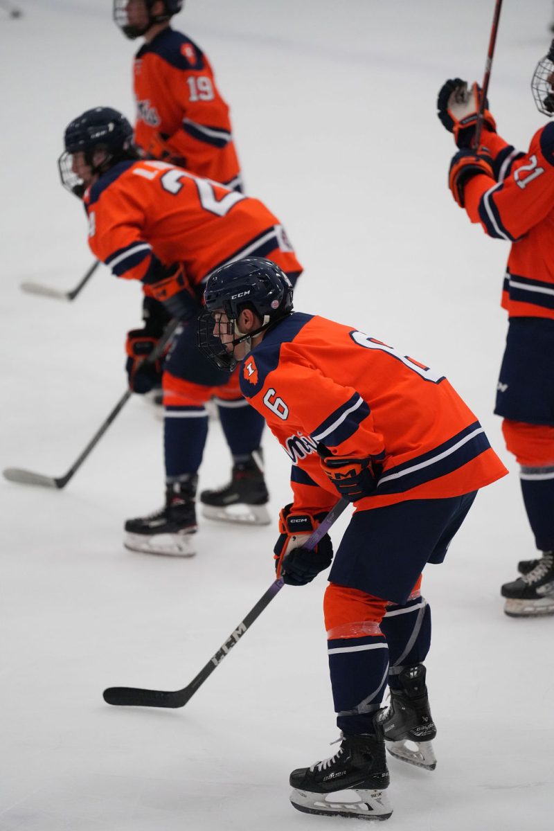 The Illini skate through warmups as they prepare to take on Michigan State on Sept. 20.