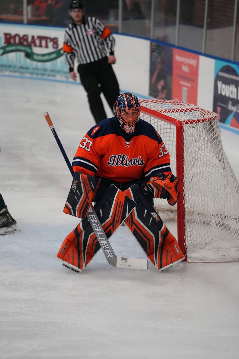 Senior goaltender Nolan Woodring watches the puck slide into the corner in a game against Michigan State on Sept. 20.