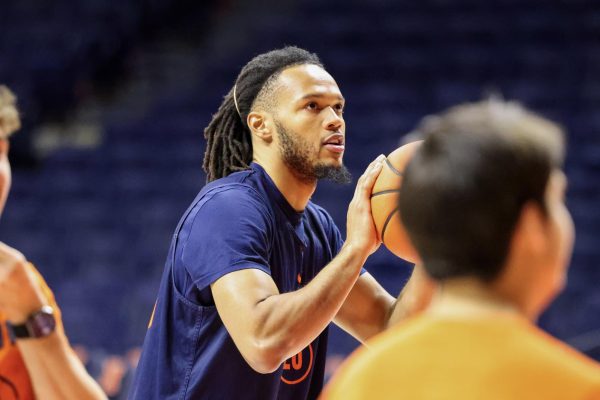 Illini guard/forward Ty Rodgers shoots a free throw at practice on Nov. 3