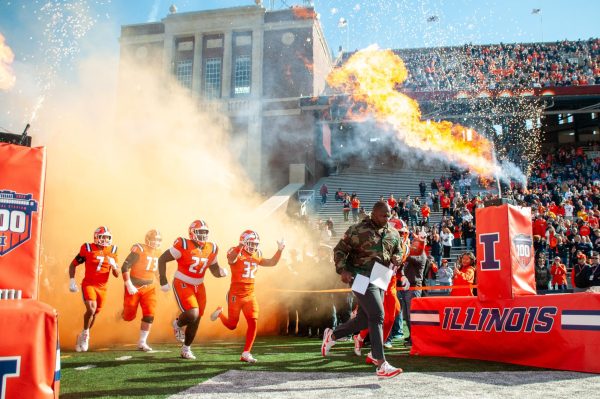 Illinois sprints out of the tunnel to greet the Dads Weekend crowd on Nov. 2. 