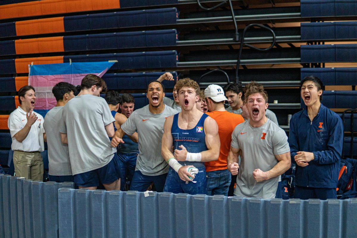 Illinois men's gymnastics cheers on its competing teammates in an upset victory over No. 1 Oklahoma.