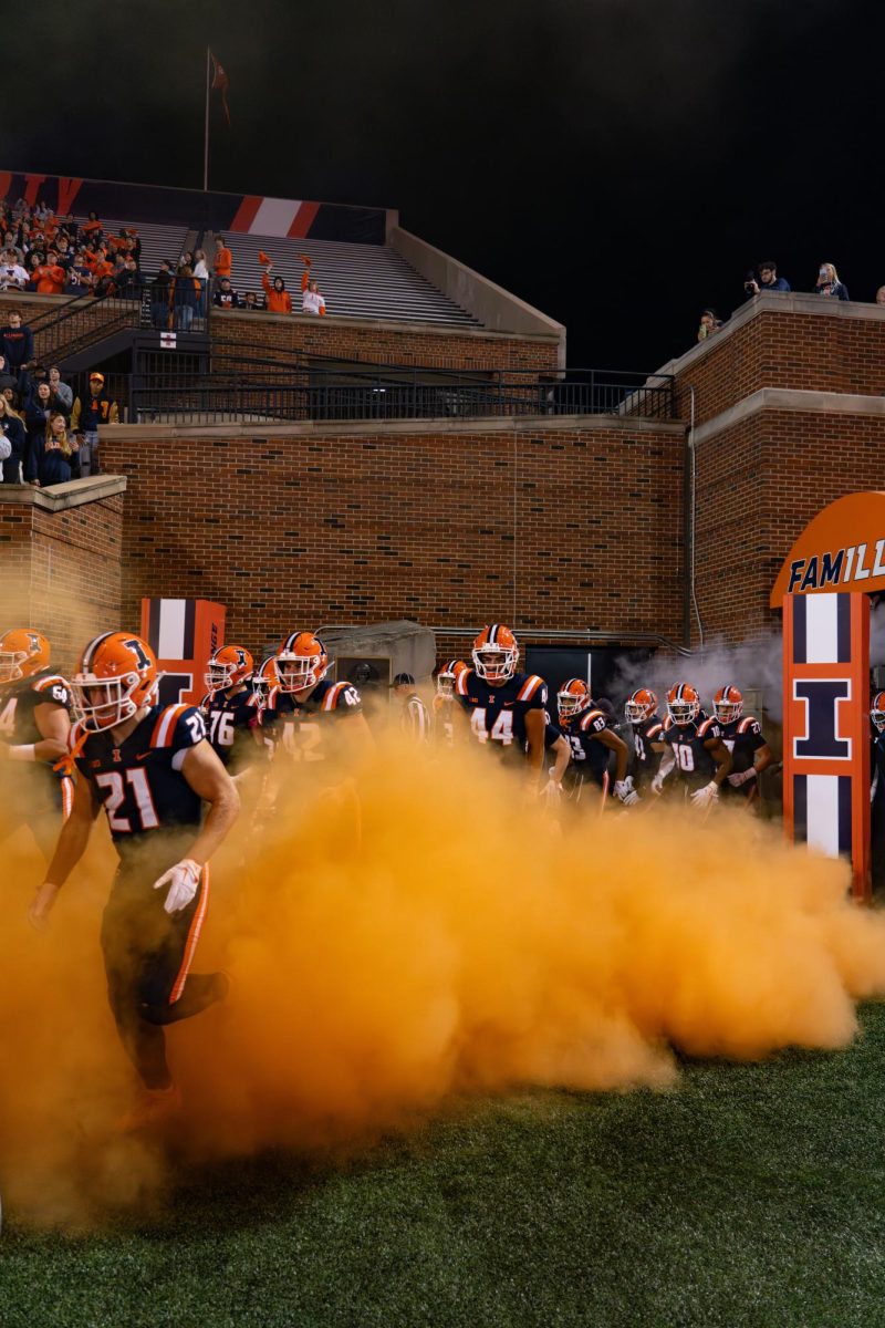 The Illini walk out from the tunnel before a game against the Nebraska Cornhuskers at Memorial Stadium on Oct. 6, 2023.