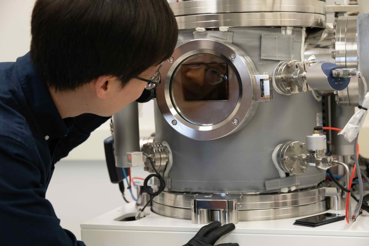 Dr. Hynseok Kim peers into the primary machine in his microLED Technology Lab on Oct. 29th.