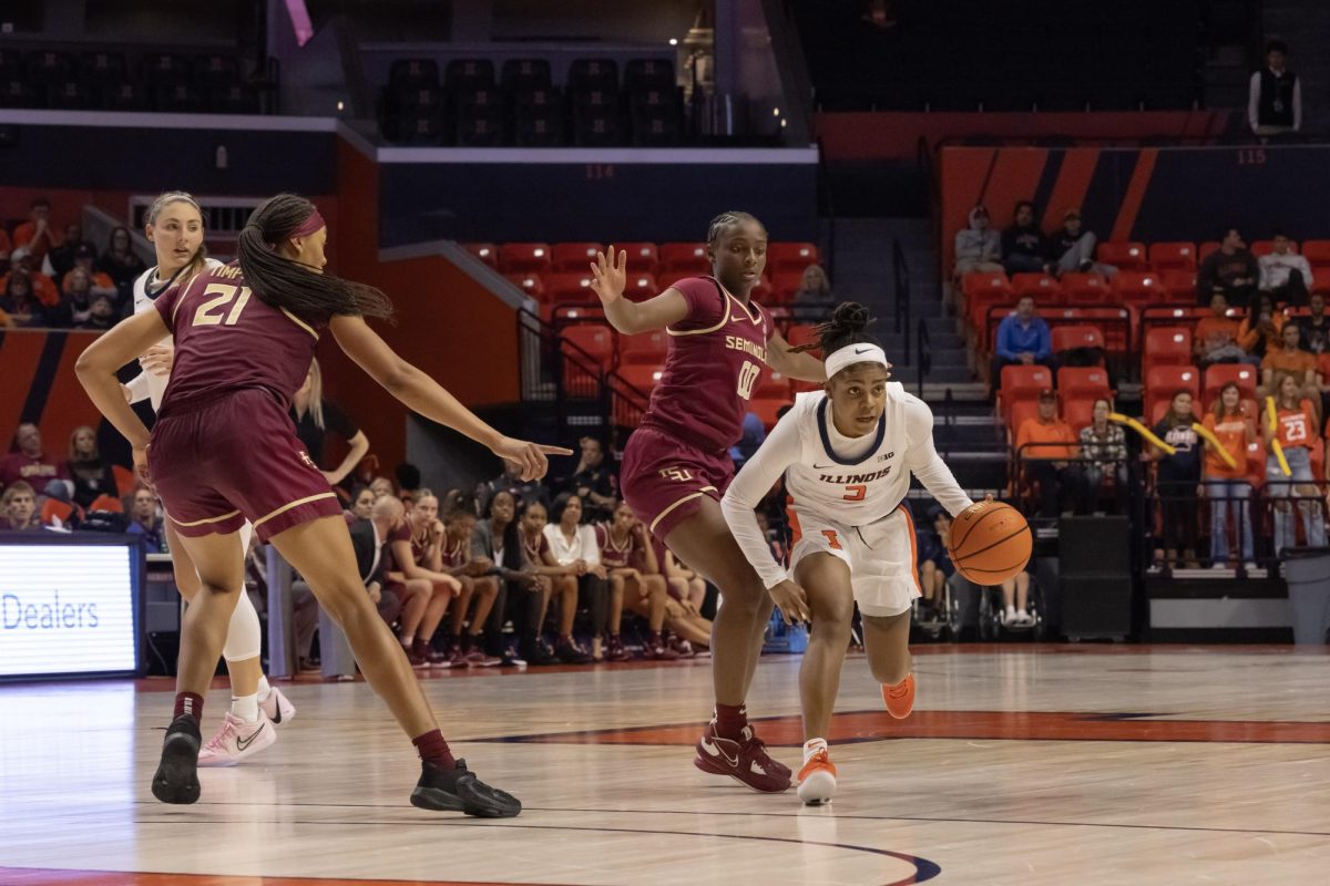 Fifth year guard Makira Cook drives to the basket against No. 19 Florida State on Nov. 3.