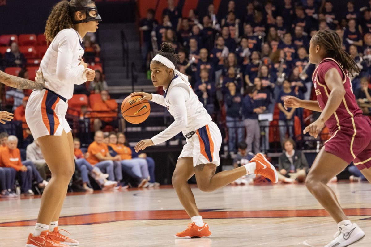 Senior forward Brynn Shoup-Hill sets a screen for fifth-year guard Makira Cook to drive to the paint in a game against No. 19 Florida State on Nov. 7.