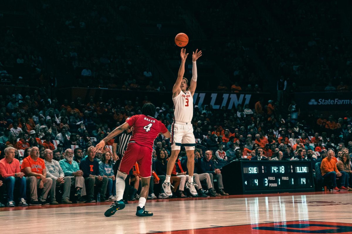 Graduate student forward Ben Humrichous shoots a three-pointer on Nov. 8 against SIUE.