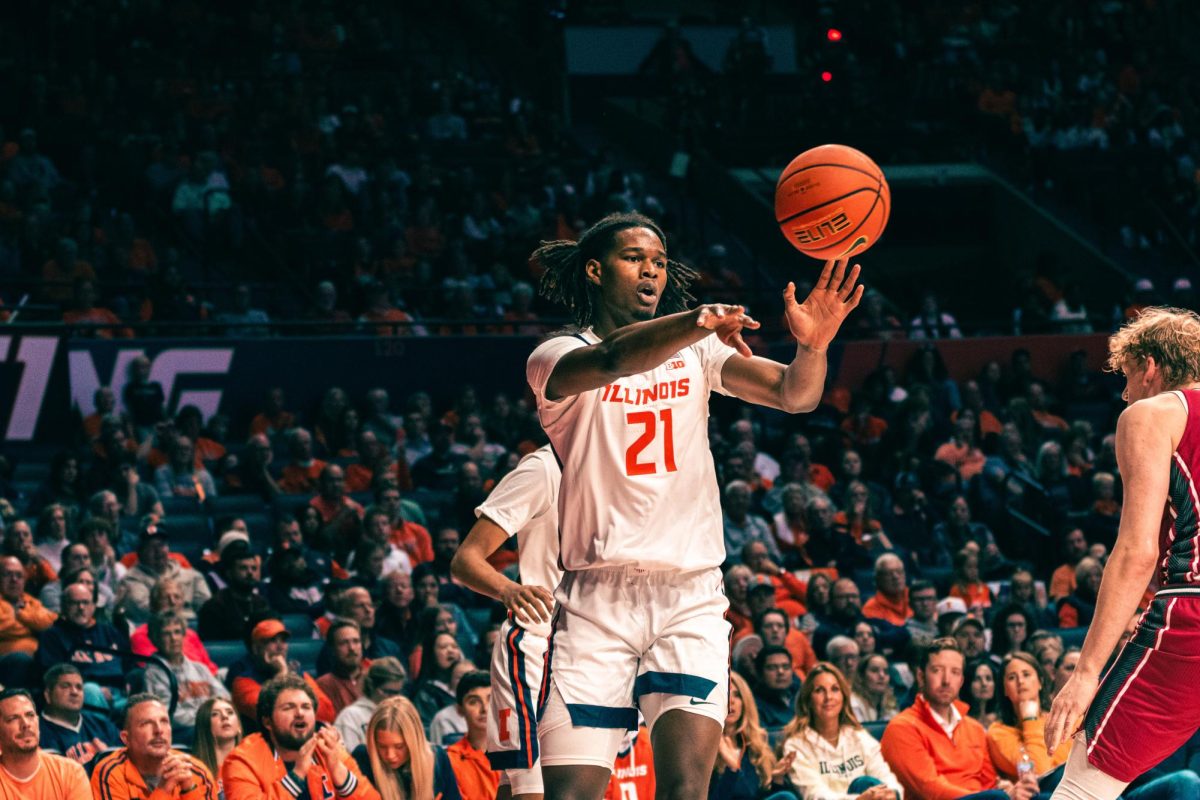 Freshman forward Morez Johnson Jr. passes the ball up the court after securing a rebound on Nov. 8. 