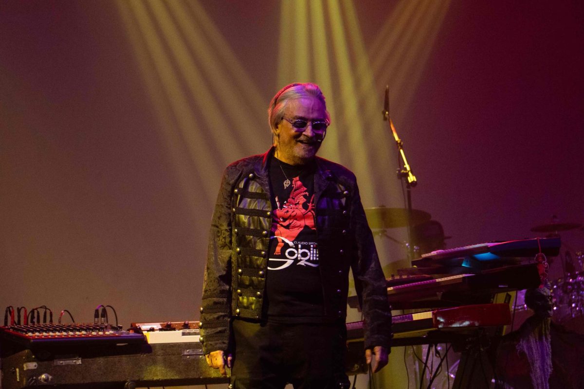 Goblin's Claudio Simonetti speaks to the crowd in-between the band's set at The Canopy Club on Dec. 14.