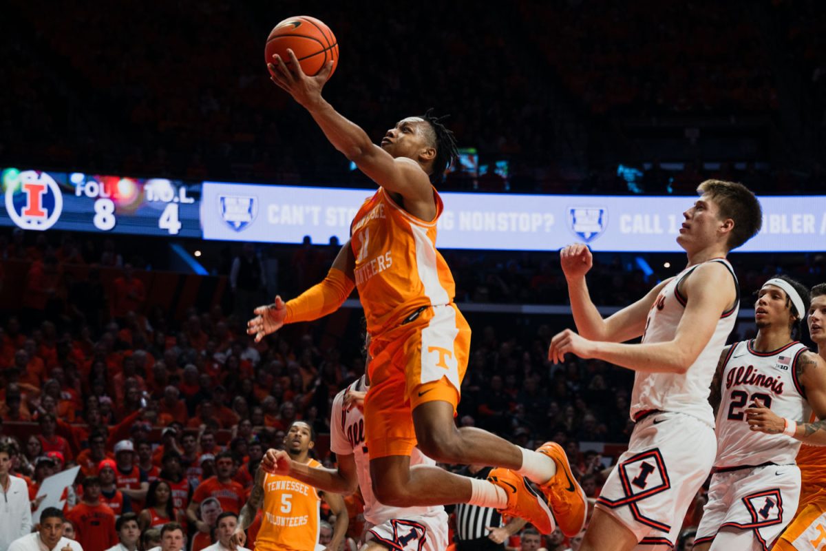 Tennessee senior guard Jordan Gainey scores against Illinois in the first half of Saturday night's game. The Illini suffered a defeat to the Volunteers after a close game at State Farm Center, with a final score of 66-64.