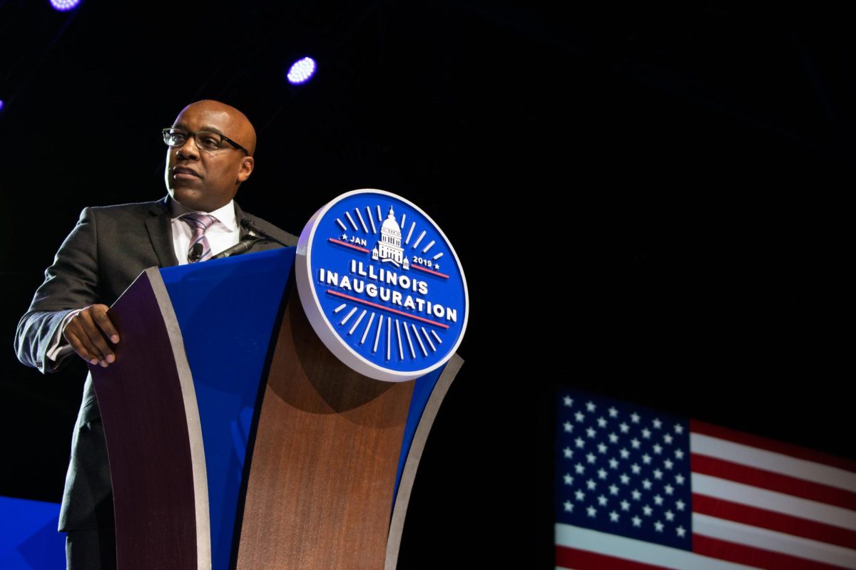 Attorney General Kwame Raoul addresses members of the audience after being sworn into office at the Bank of Springfield Center on Jan. 14, 2019.